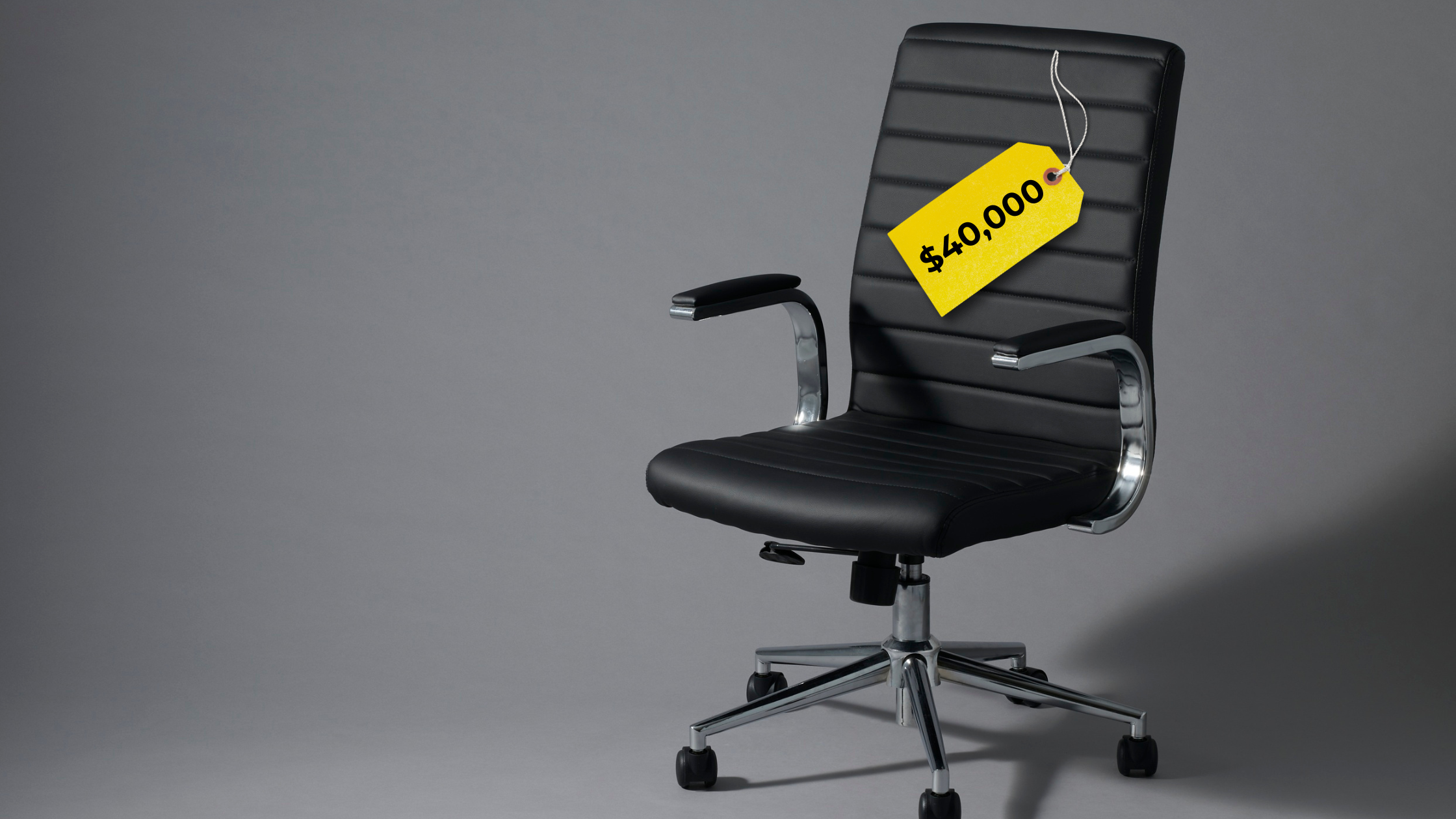 black office chair in an empty room with a $40,000 price tag to symbolise the cost of a slipping newsletter