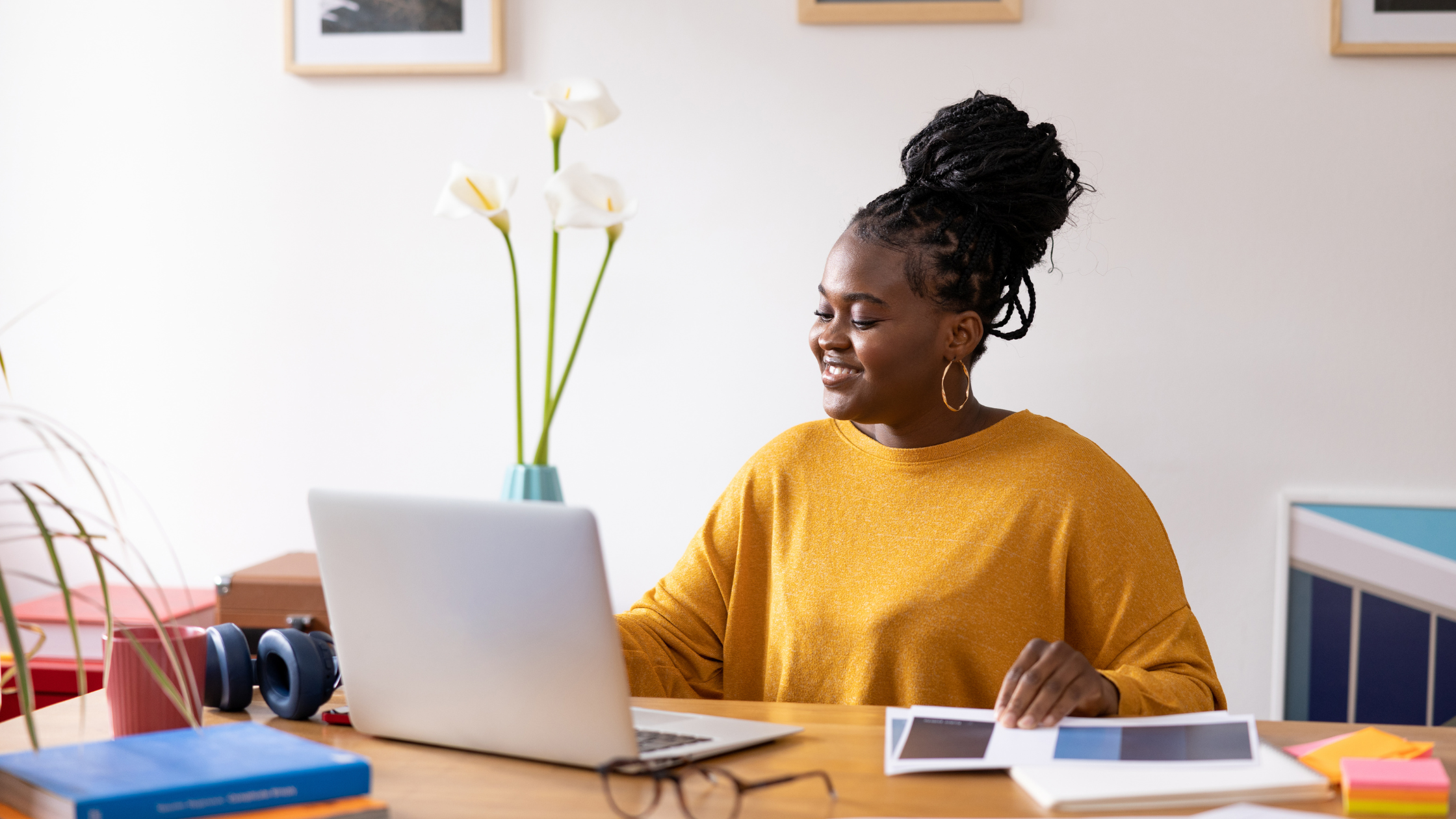 Young black female entrepreneur working from home